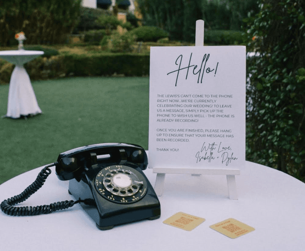 Vintage rotary phone audio guestbook with a 'Hello!' welcome sign