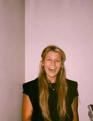 Arabella laughing in a black top, on 35mm film