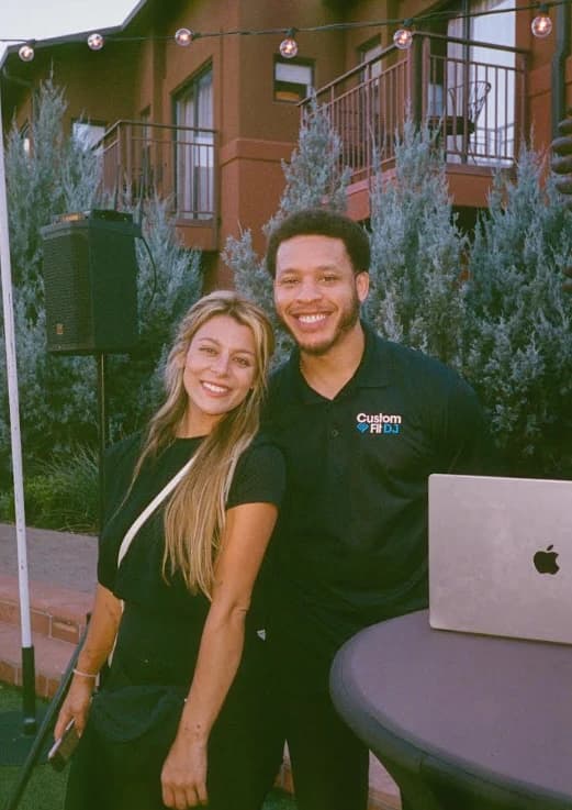 Arabella with the DJ from Custom Fit DJ at a Sedona reception, on 35mm film